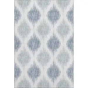 Photo of Sky Blue And Ivory Ikat Washable Area Rug With UV Protection