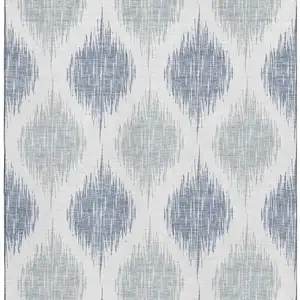 Photo of Sky Blue And Ivory Ikat Washable Area Rug With UV Protection