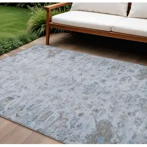 Photo of Sky Blue And Ivory Medallion Washable Indoor Outdoor Area Rug