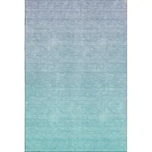 Photo of Sky Blue And Ivory Ombre Washable Area Rug With UV Protection