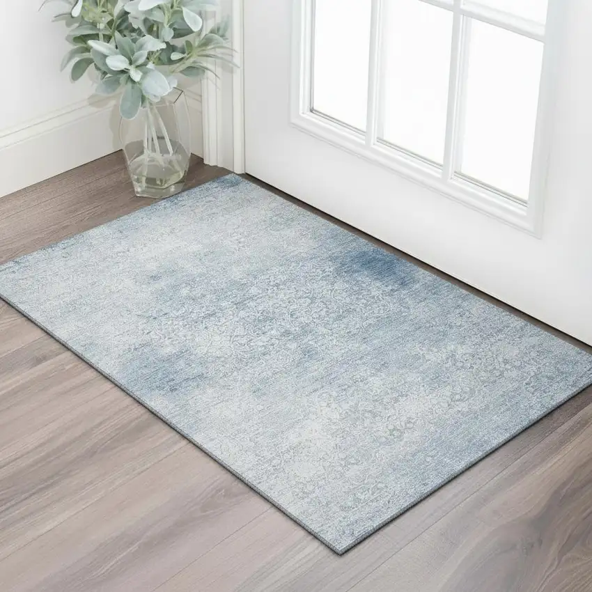Sky Blue And Ivory Oriental Washable Area Rug With UV Protection Photo 2
