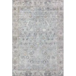 Photo of Sky Blue And Ivory Oriental Washable Area Rug With UV Protection
