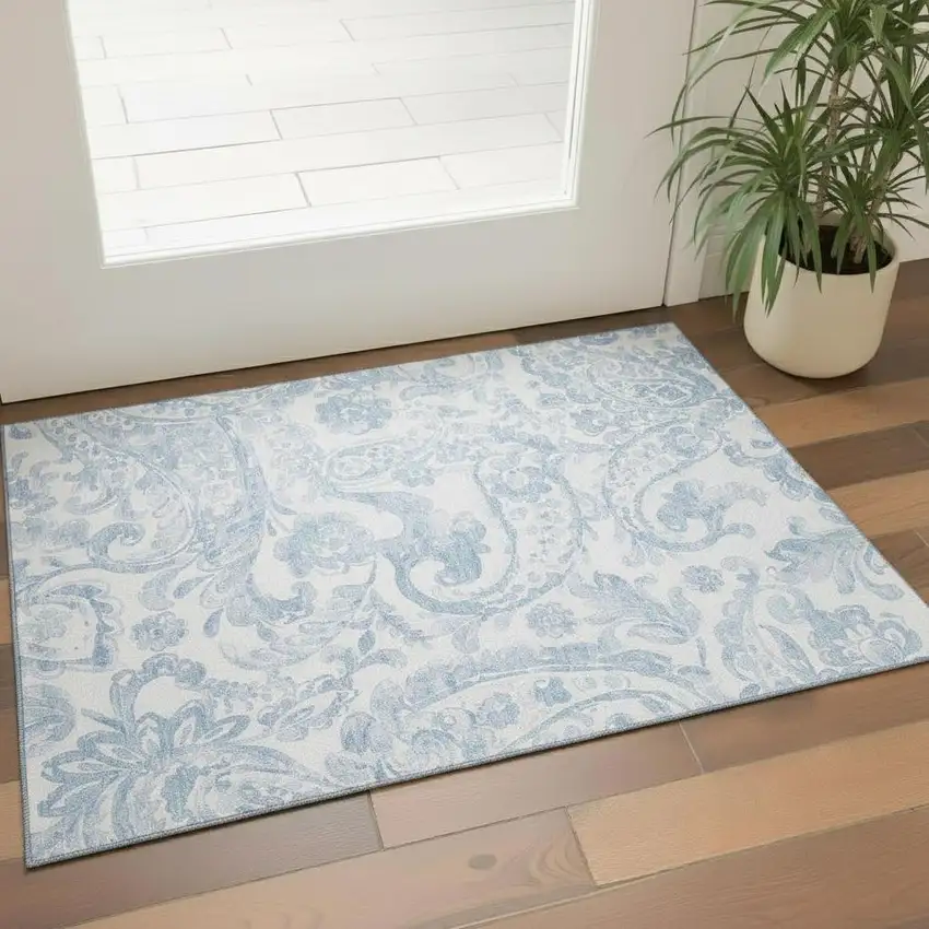 Sky Blue And Ivory Paisley Washable Area Rug With UV Protection Photo 1