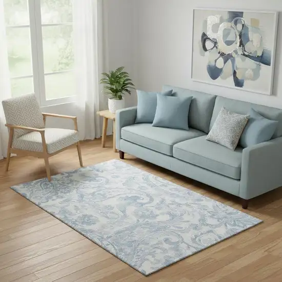 Sky Blue And Ivory Paisley Washable Area Rug With UV Protection Photo 1