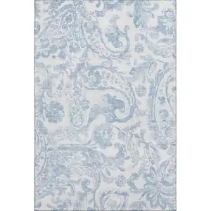 Photo of Sky Blue And Ivory Paisley Washable Area Rug With UV Protection