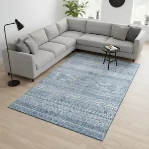 Photo of Sky Blue And Ivory Southwestern Washable Area Rug With UV Protection