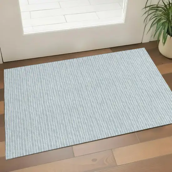 Sky Blue And Ivory Striped Washable Area Rug With UV Protection Photo 1