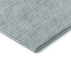 Photo of Sky Blue And Ivory Striped Washable Area Rug With UV Protection