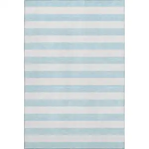 Photo of Sky Blue And Ivory Striped Washable Area Rug With UV Protection