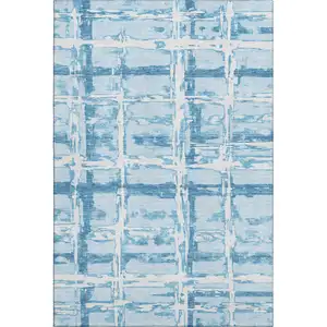 Photo of Sky Blue And Ivory Striped Washable Area Rug With UV Protection