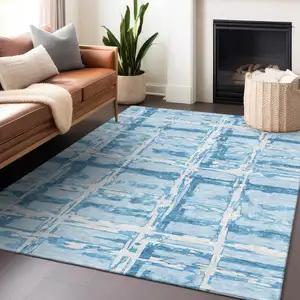 Photo of Sky Blue And Ivory Striped Washable Area Rug With UV Protection