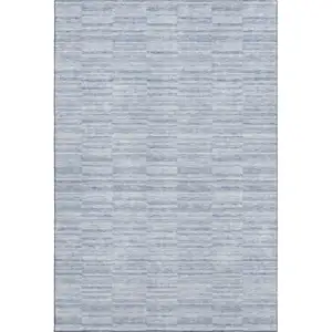 Photo of Sky Blue And Ivory Striped Washable Area Rug With UV Protection