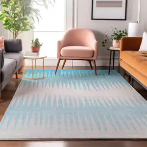 Photo of Sky Blue And Ivory Striped Washable Area Rug With UV Protection