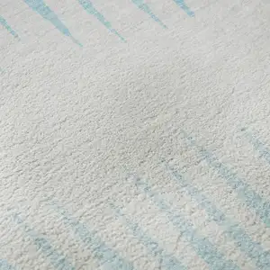 Photo of Sky Blue And Ivory Striped Washable Area Rug With UV Protection