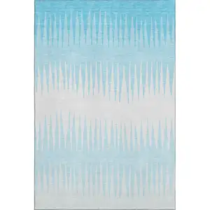 Photo of Sky Blue And Ivory Striped Washable Area Rug With UV Protection