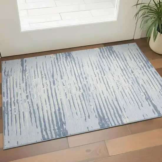 Sky Blue And Ivory Striped Washable Area Rug With UV Protection Photo 1