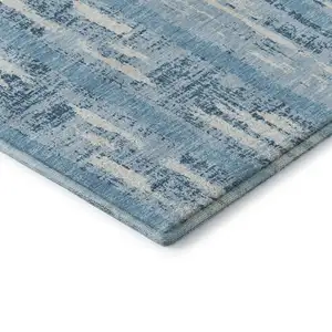 Photo of Sky Blue And Ivory Striped Washable Area Rug With UV Protection