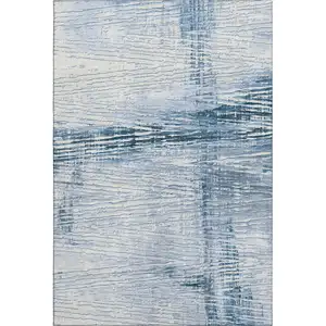 Photo of Sky Blue And Ivory Striped Washable Area Rug With UV Protection
