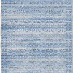Photo of Sky Blue And Ivory Striped Washable Area Rug With UV Protection