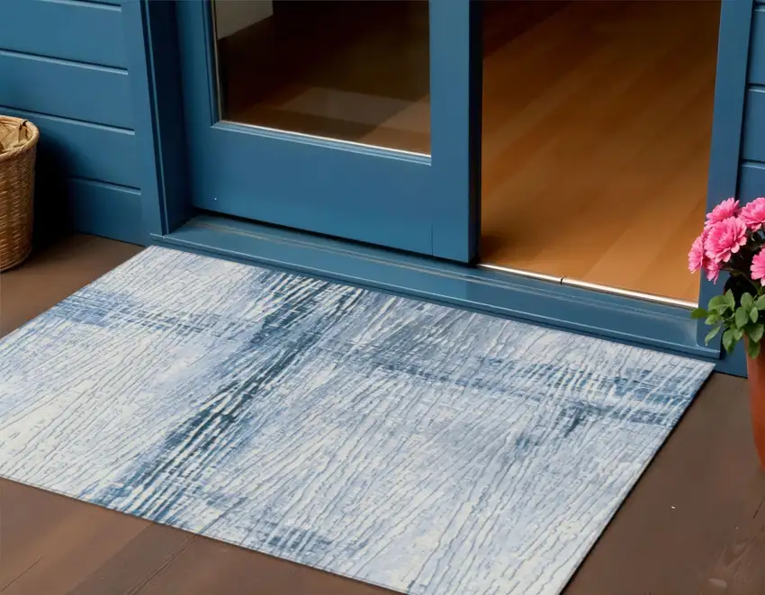 Sky Blue And Ivory Striped Washable Indoor Outdoor Area Rug Photo 1