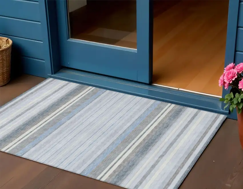 Sky Blue And Ivory Striped Washable Indoor Outdoor Area Rug Photo 1