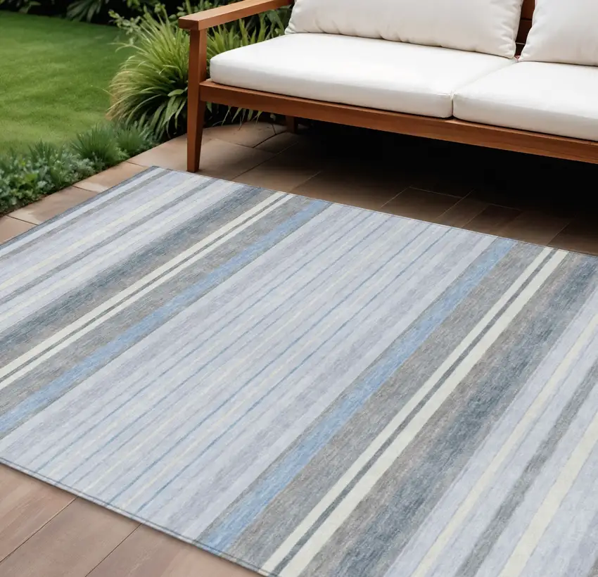 Sky Blue And Ivory Striped Washable Indoor Outdoor Area Rug Photo 1