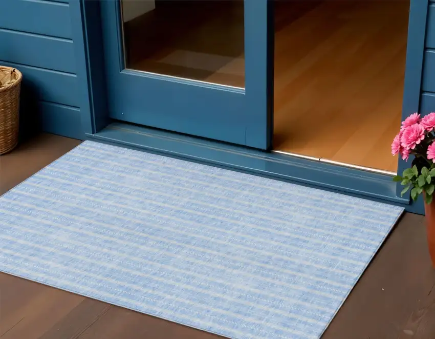 Sky Blue And Ivory Striped Washable Indoor Outdoor Area Rug Photo 1