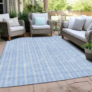 Photo of Sky Blue And Ivory Striped Washable Indoor Outdoor Area Rug