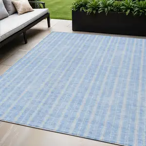 Photo of Sky Blue And Ivory Striped Washable Indoor Outdoor Area Rug