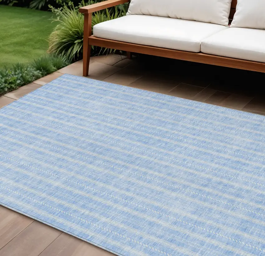Sky Blue And Ivory Striped Washable Indoor Outdoor Area Rug Photo 1