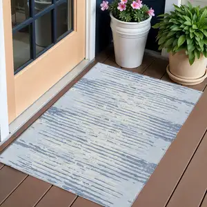 Photo of Sky Blue And Ivory Striped Washable Indoor Outdoor Area Rug