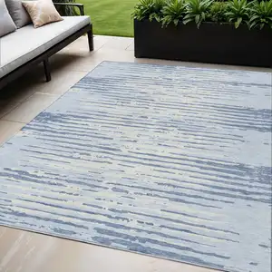 Photo of Sky Blue And Ivory Striped Washable Indoor Outdoor Area Rug