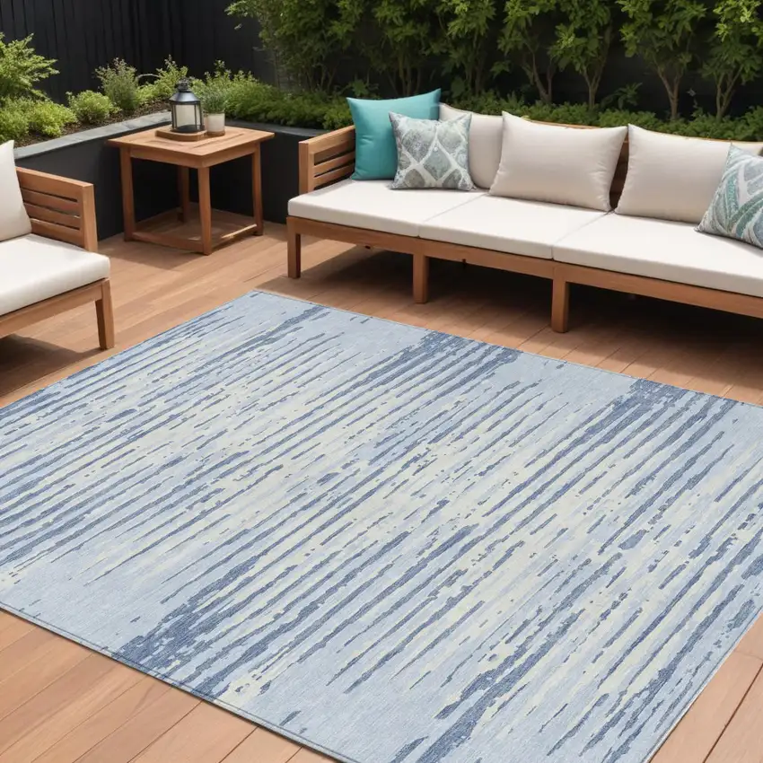 Sky Blue And Ivory Striped Washable Indoor Outdoor Area Rug Photo 1