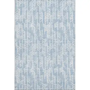 Photo of Sky Blue And Ivory Tribal Washable Area Rug With UV Protection