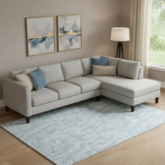 Sky Blue And Ivory Tribal Washable Area Rug With UV Protection Photo 1