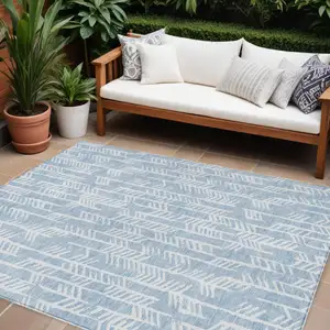 Photo of Sky Blue And Ivory Tribal Washable Indoor Outdoor Area Rug