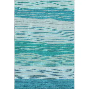 Photo of Sky Blue And Teal Blue Striped Washable Area Rug With UV Protection