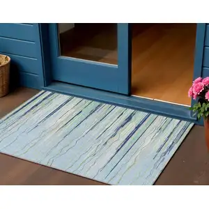 Photo of Sky Blue Aqua And Gray Striped Washable Indoor Outdoor Area Rug