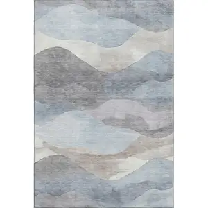 Photo of Sky Blue Beige And Ivory Abstract Washable Area Rug With UV Protection