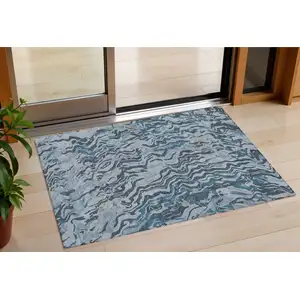 Photo of Sky Blue Black And Teal Blue Abstract Washable Indoor Outdoor Area Rug