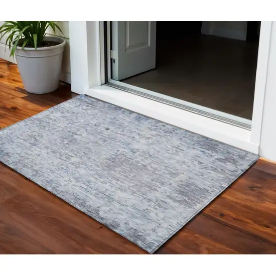 Sky Blue Charcoal And Ivory Abstract Washable Indoor Outdoor Area Rug Photo 1