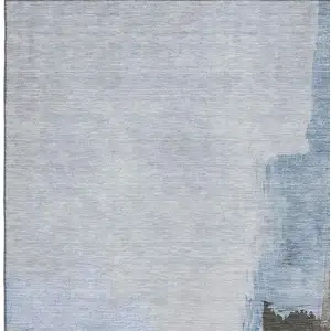 Photo of Sky Blue Chocolate And Taupe Abstract Washable Area Rug With UV Protection