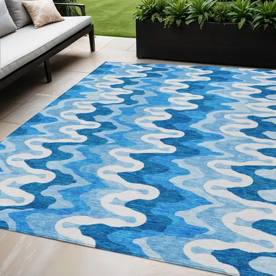 Sky Blue Denim Blue And Ivory Abstract Washable Indoor Outdoor Area Rug Photo 1