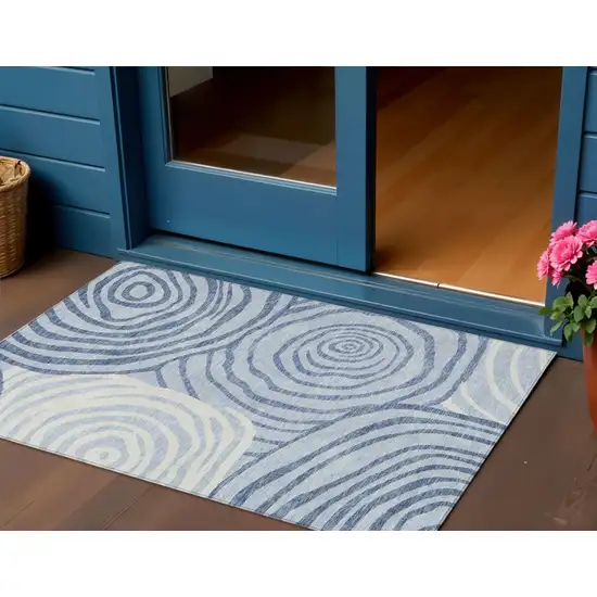 Sky Blue Denim Blue And Ivory Abstract Washable Indoor Outdoor Area Rug Photo 1