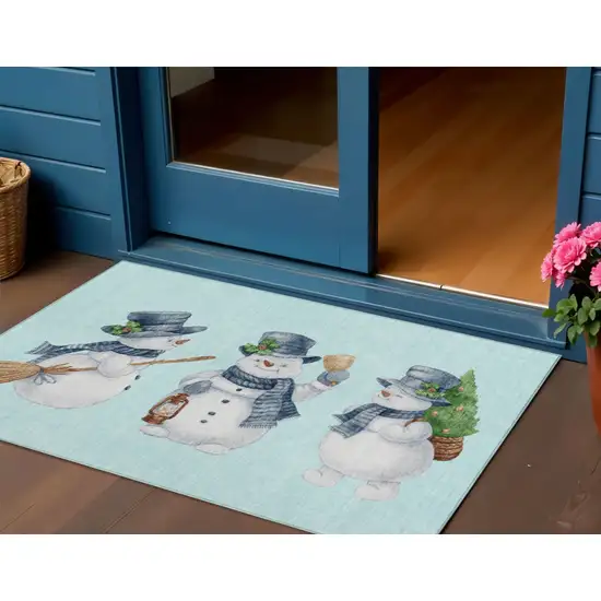 Sky Blue Denim Blue And Ivory Snowmen Washable Indoor Outdoor Area Rug Photo 1