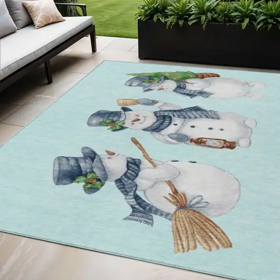 Sky Blue Denim Blue And Ivory Snowmen Washable Indoor Outdoor Area Rug Photo 1