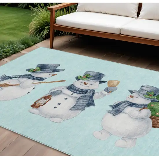 Sky Blue Denim Blue And Ivory Snowmen Washable Indoor Outdoor Area Rug Photo 1