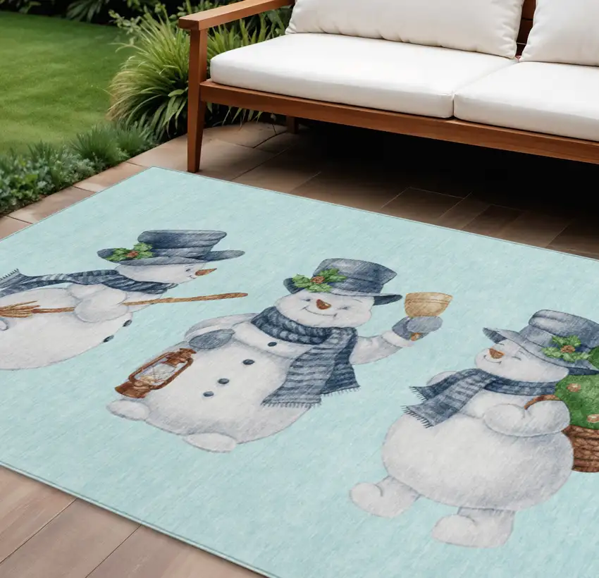 Sky Blue Denim Blue And Ivory Snowmen Washable Indoor Outdoor Area Rug Photo 1