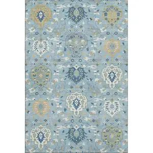 Photo of Sky Blue Gold And Gray Damask Washable Area Rug With UV Protection