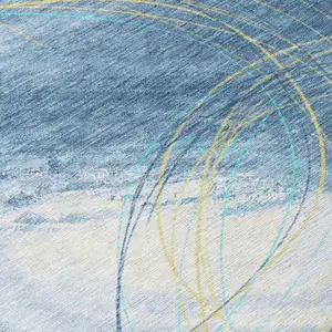 Photo of Sky Blue Gold And Ivory Abstract Washable Indoor Outdoor Area Rug